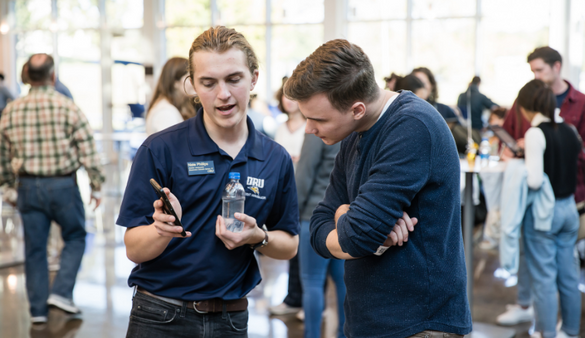 ORU admissions counselor helping a student